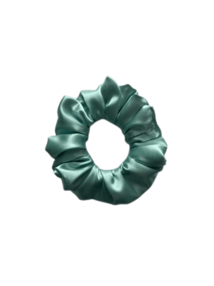 Teal blue satin scrunchie in 'Aqua' on a transparent background | Twentyseven Toronto