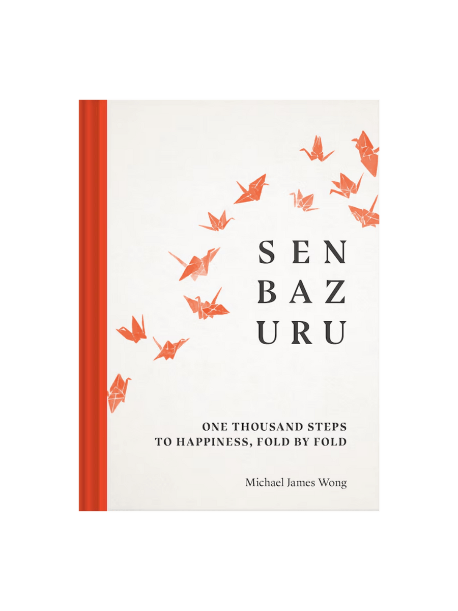 Front cover of the book Senbazuru: One Thousand Steps To Happiness, Fold By Fold by Michael James Wong with orange folded cranes and orange line one the left edge | Twentyseven Toronto