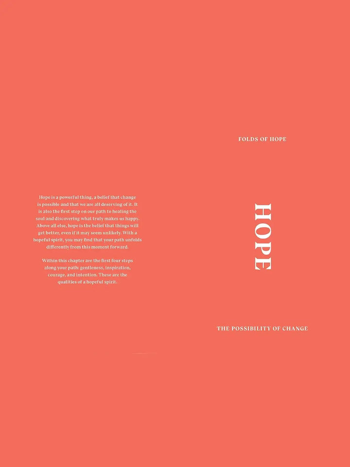 Orange book spread from Senbazuru: One Thousand Steps To Happiness, Fold By Fold by Michael James Wong features a reflective passage on "Hope" and the "Possibility of Change." | Twentyseven Toronto