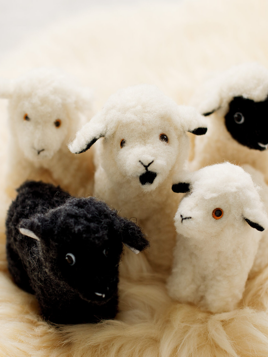 Yoko Wool Sheep Mini in Natural styled with a group of handcrafted wool sheep in black and white | Twentyseven Toronto