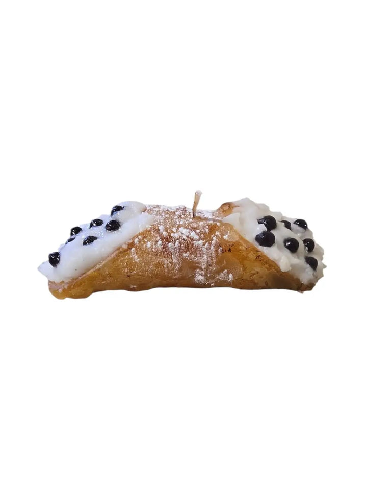 Sicilian Cannoli candle with cream and chocolate chip details from Cereria Introna on a white background | Twentyseven Toronto