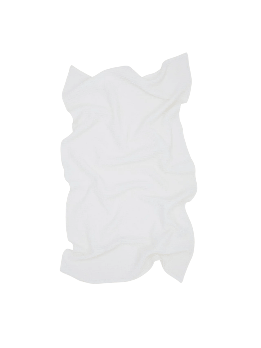 A white towel artfully crumpled showcasing the unique texture of the Simple Waffle Towel - White from Hawkins New York against a transparent background | Twentyseven Toronto