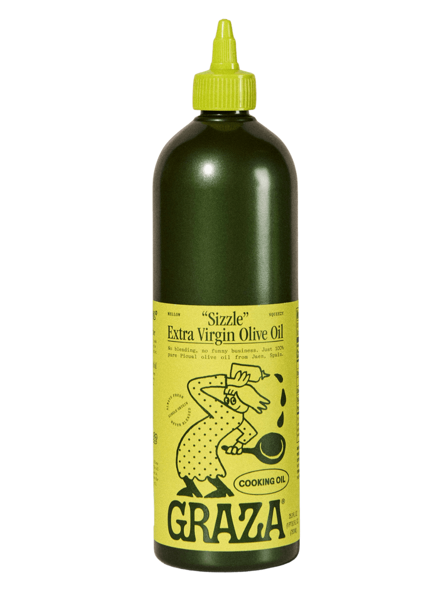 750ml bottle of Graza 'Sizzle' Extra Virgin Olive Oil with a green label and yellow cap on a transparent background | Twentyseven Toronto