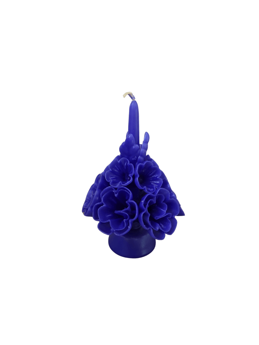 Floral wax candle called the Small Flaked Candle in Blue from Cereria de Jesus against a transparent background | Twentyseven Toronto