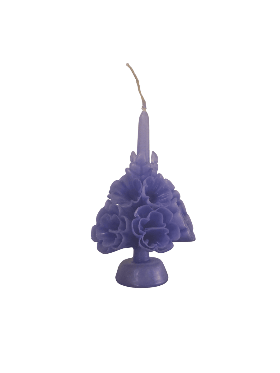 Purple floral wax candle called the Small Flaked Candle in Pale Purple from Cereria de Jesus against a transparent background | Twentyseven Toronto