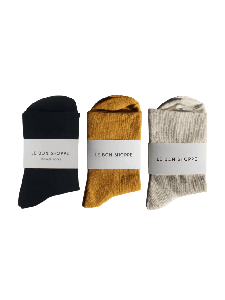Three pairs of Le Bon Shoppe Sneaker Socks in 'True Black', 'Marigold' and 'Oatmeal' | Twentyseven Toronto