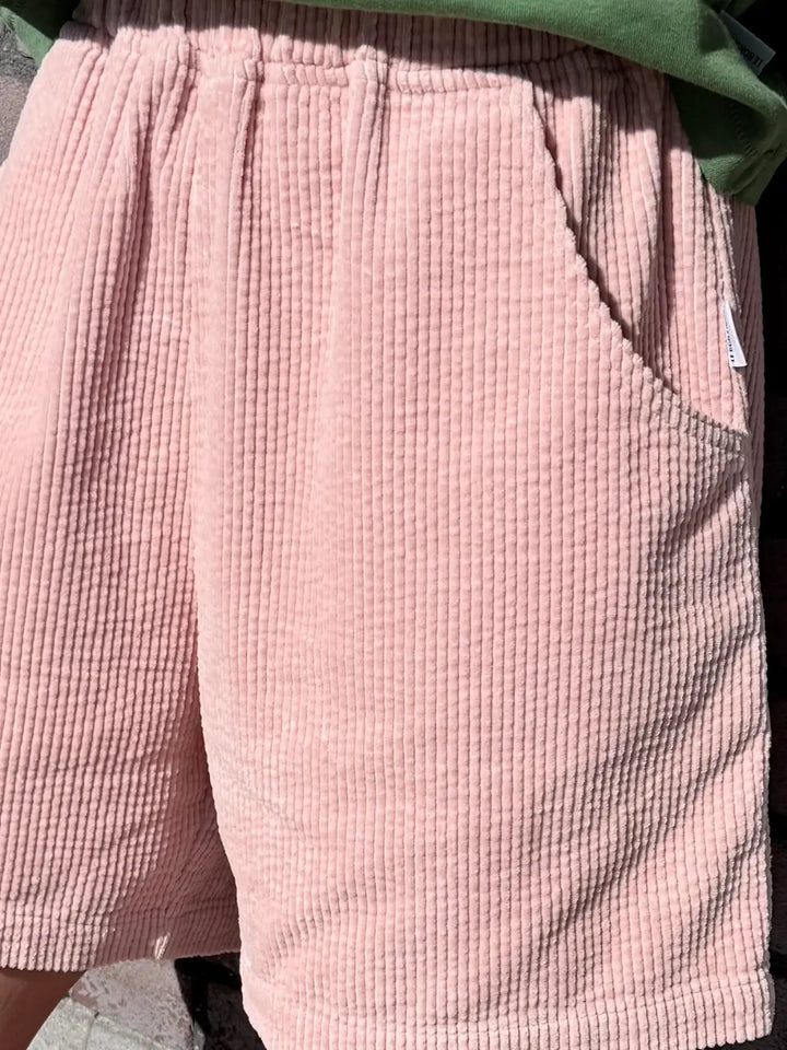 Close-up of pink 'Soft Corduroy City Shorts' in 'Baby Pink' from Le Bon Shoppe  | Twentyseven Toronto