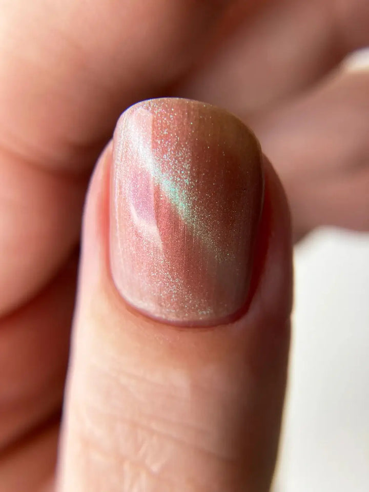 Close up of glittery pink and light green gradient nails using 'Something Else' magnetic nail polish by Death Valley Nails | Twentyseven Toronto