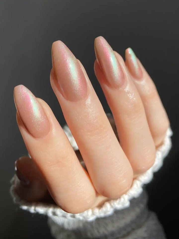 Close up of hand with long pink and light green gradient nails using 'Something Else' magnetic nail polish by Death Valley Nail | Twentyseven Toronto