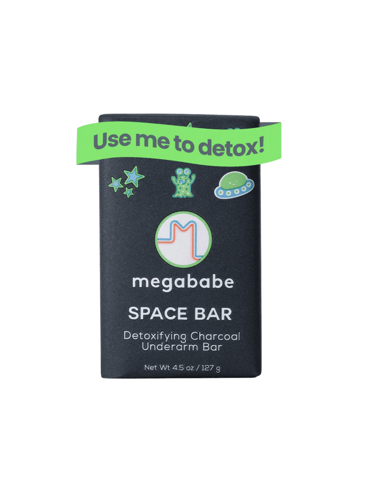 Detoxifying charcoal underarm 'Space Bar' by Megababe on a transparent background | Twentyseven Toronto
