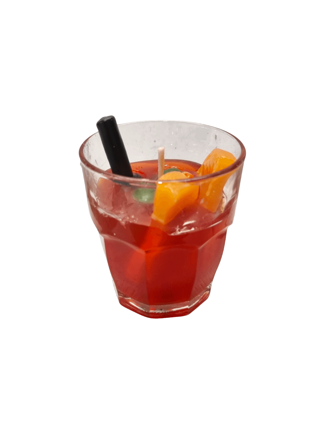 Clear glass with a red cocktail, orange slice, and black straw wax candle from Cereria Introna on a transparent background | Twentyseven Toronto