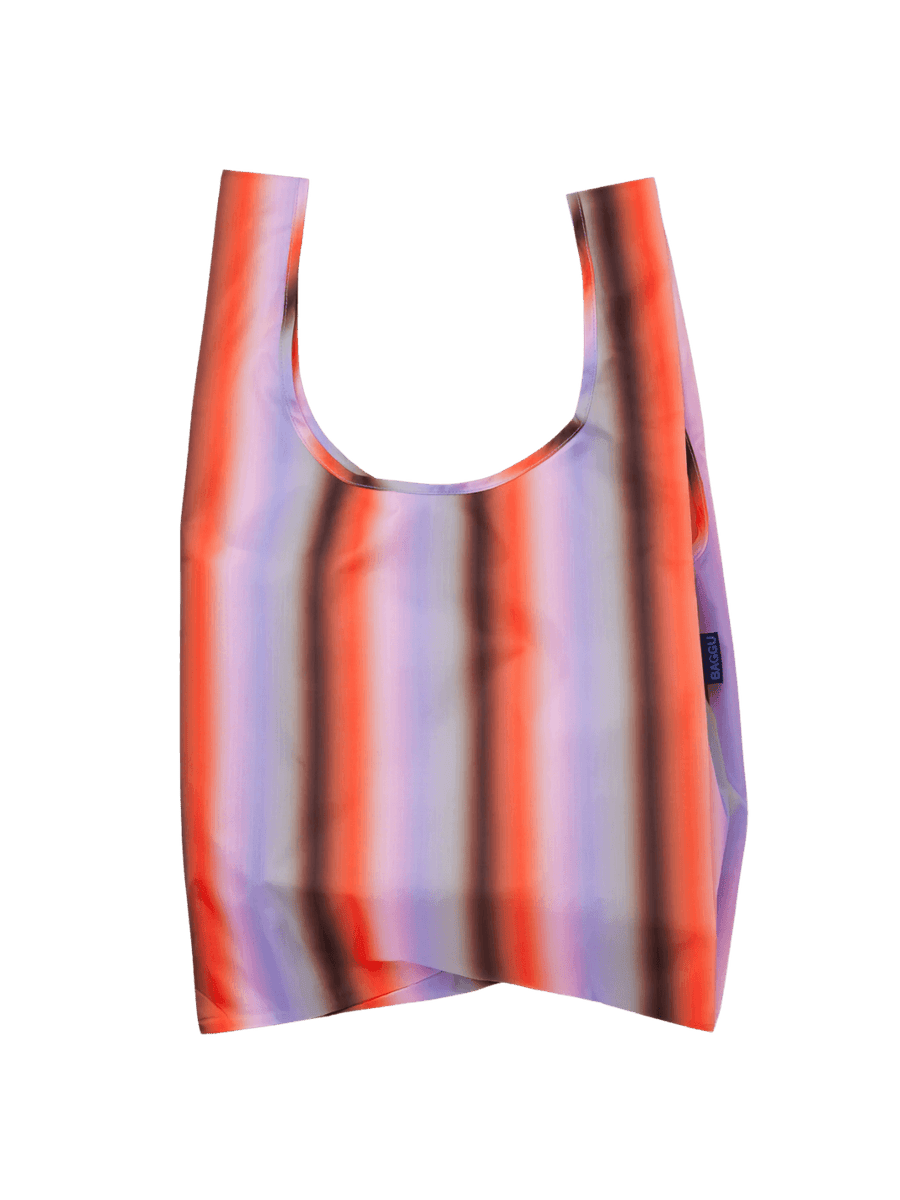 BAGGU Standard Baggu Bag in Gradient Stripe Poppy & Lilac featuring vertical blurred stripes of orange, lavender, and deep brown against a transparent background | Twentyseven Toronto
