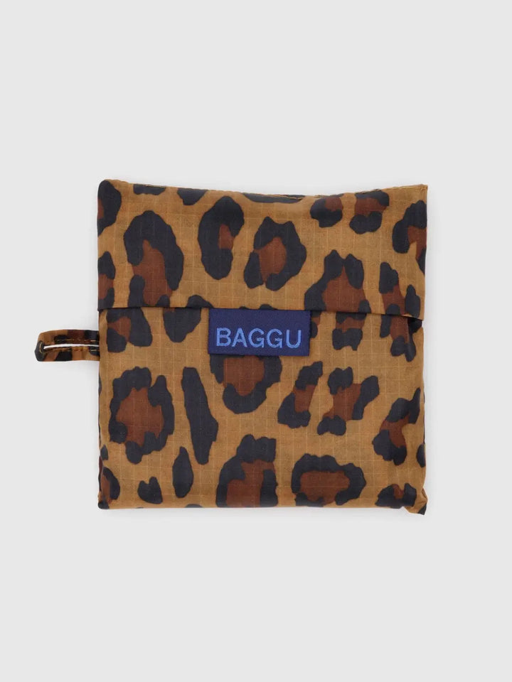 The BAGGU Standard Baggu in Leopard is neatly folded into its matching square storage pouch | Twentyseven Toronto