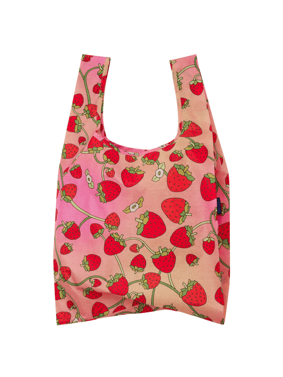 BAGGU Standard Baggu Bag in Strawberry Blossom features a pink and peach gradient background layered with an all-over red strawberry and green vine print | Twentyseven Toronto