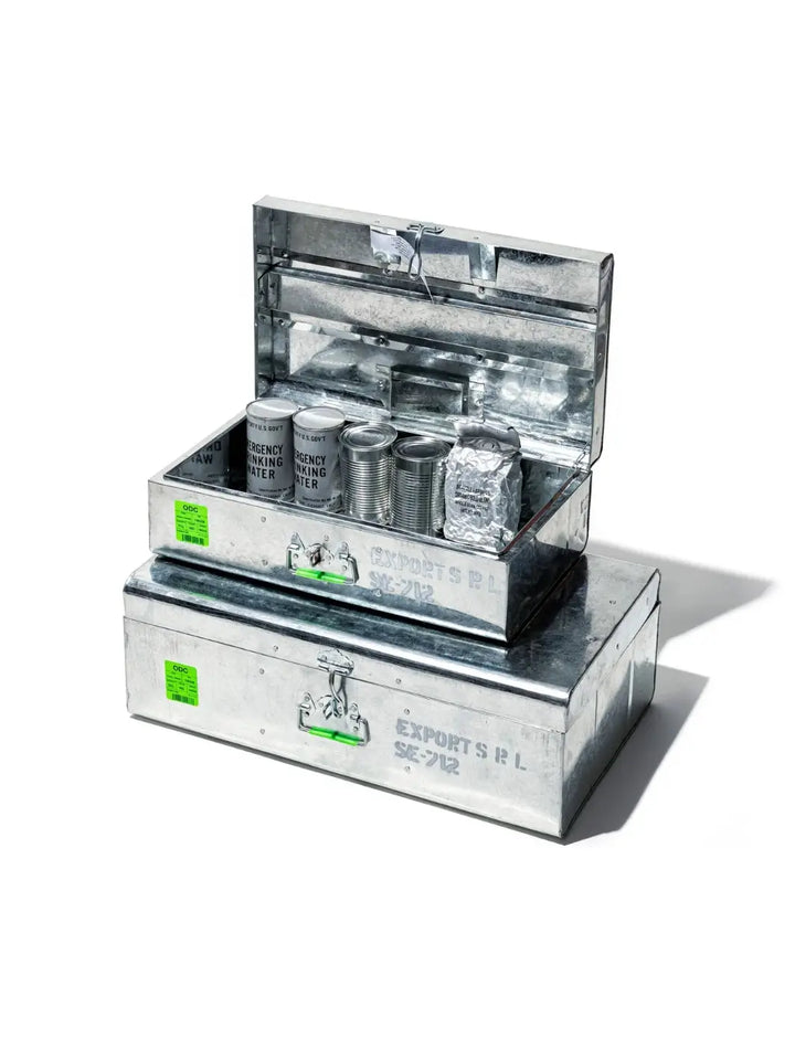 A modular storage setup showcasing an open Steel Trunk / 11L and 22L from Puebco stacked on top of a larger matching closed galvanized storage box | Twentyseven Toronto