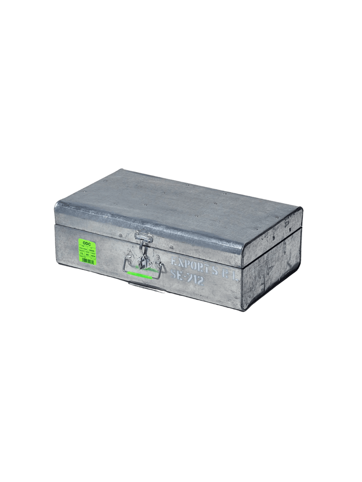 Closed Steel Trunk / 11L from Puebco, featuring its rugged latches, side handle, industrial stamping, and bright green product tag | Twentyseven Toronto