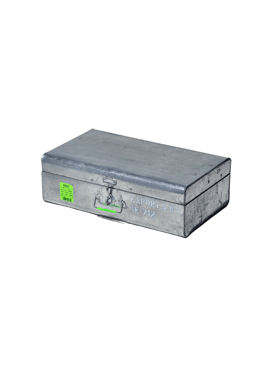Closed Steel Trunk / 11L from Puebco, featuring its rugged latches, side handle, industrial stamping, and bright green product tag | Twentyseven Toronto