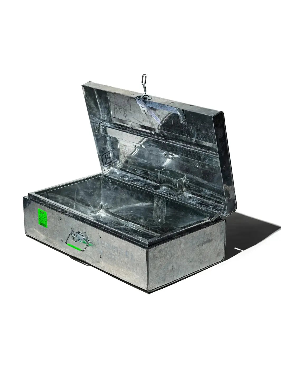 Angled product shot of the empty, open Steel Trunk / 22L from Puebco, highlighting its spacious galvanized metal interior and sturdy hinged lid against a white background | Twentyseven Toronto