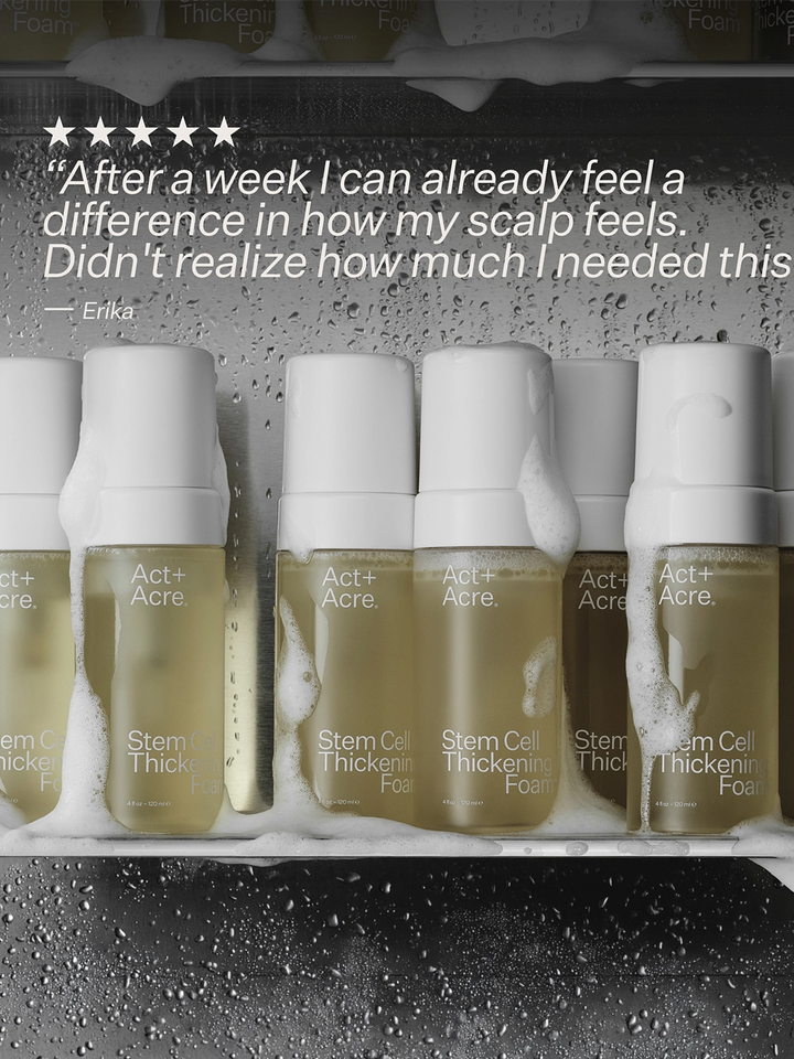 Act+Acre Stem Cell Thickening Foam bottles displayed with foam and water droplets, featuring a five-star customer review | Twentyseven Toronto