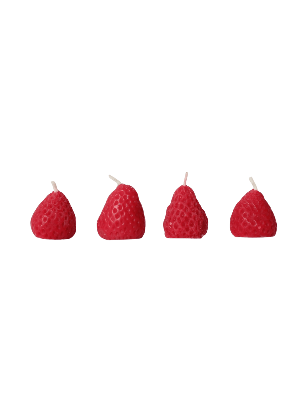 Four red strawberry-shaped beeswax candles from Happy Organics on a transparent background | Twentyseven Toronto
