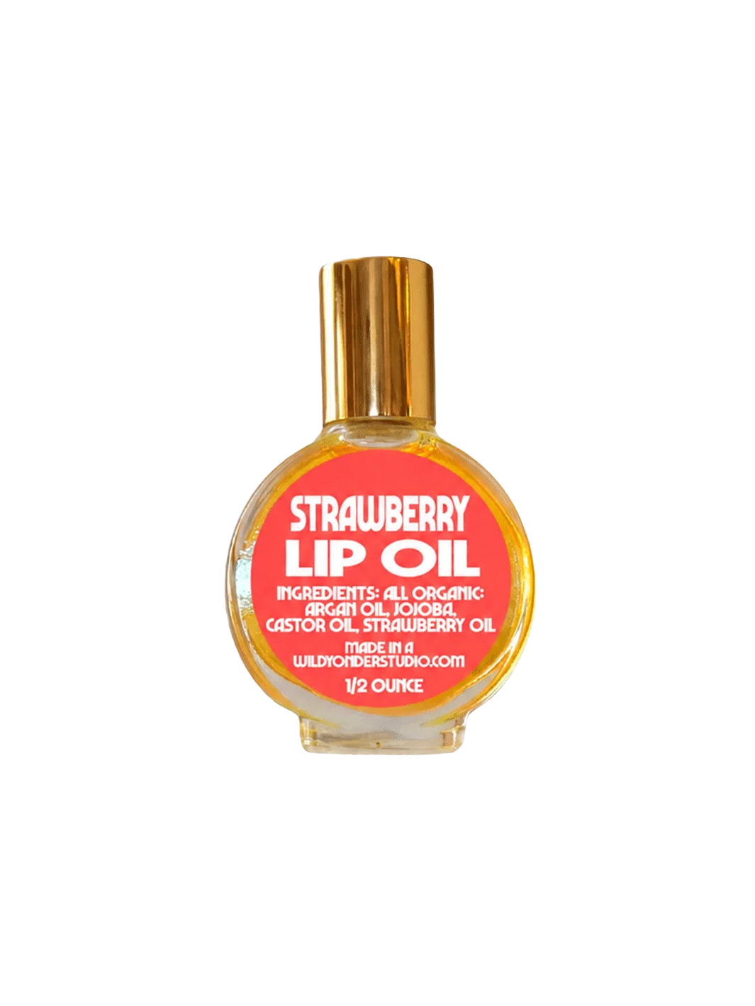 Wild Yonder Studio Strawberry Lip Oil in a glass bottle with a coral pink label and gold cap | Twentyseven Toronto