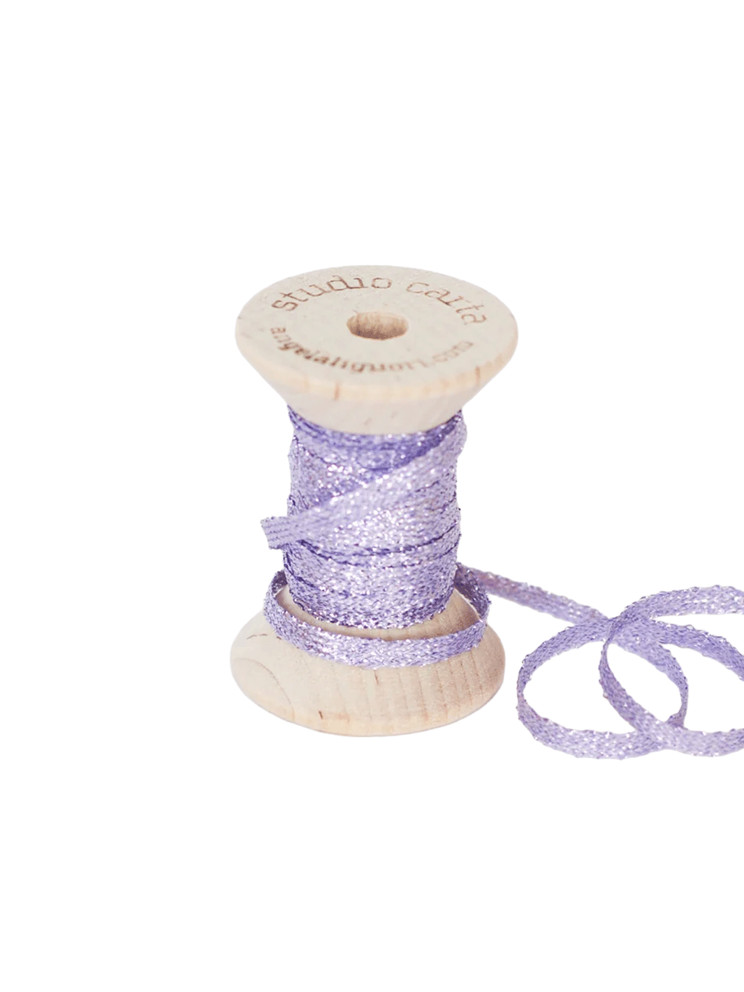 Studio Carta Metallic Braided Ribbon in Lilac wrapped around a wooden spool with ribbon unfurled | Twentyseven Toronto