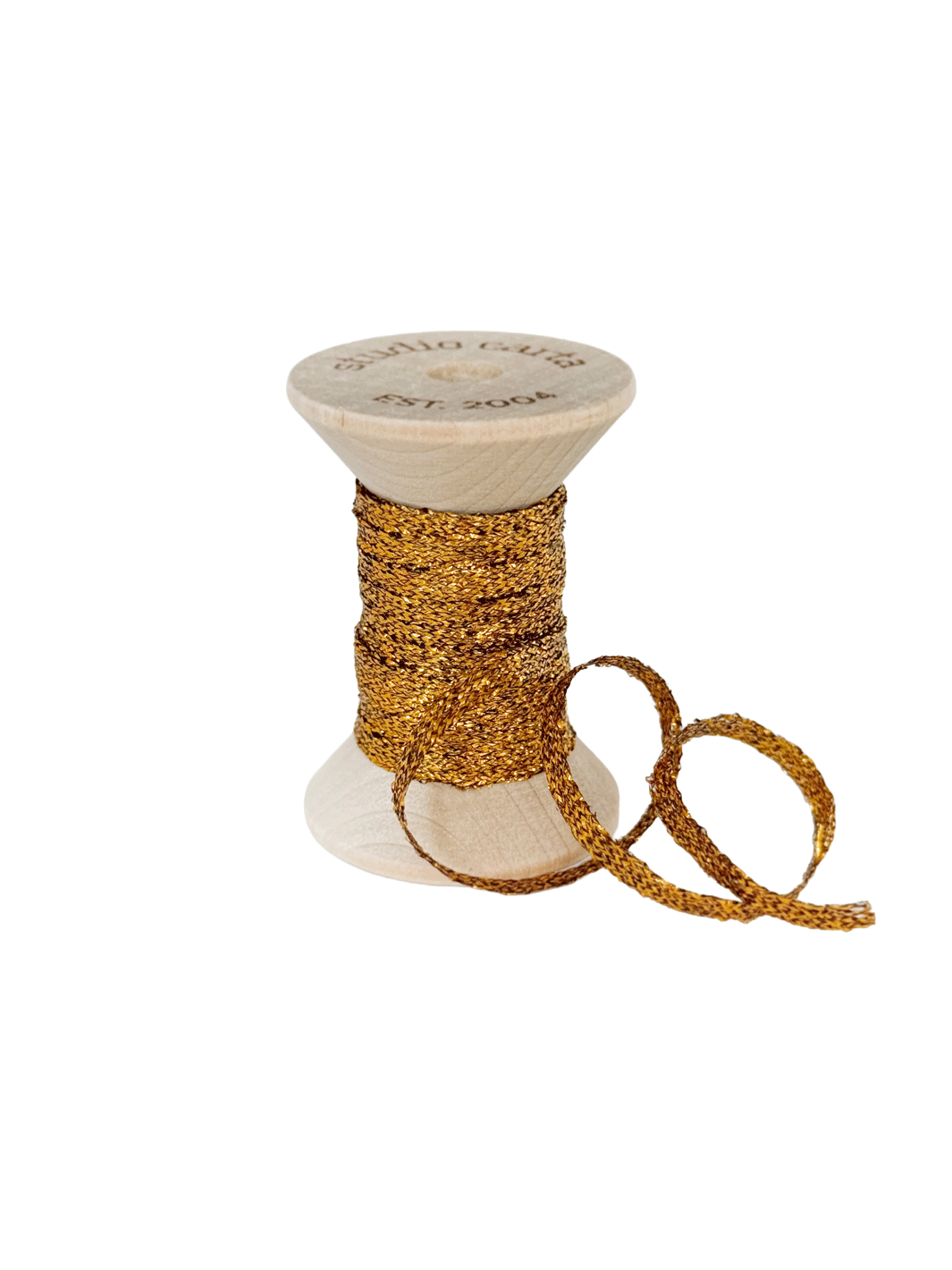 Studio Carta Metallic Braided Ribbon in Amber wrapped around a wooden spool with ribbon unfurled | Twentyseven Toronto