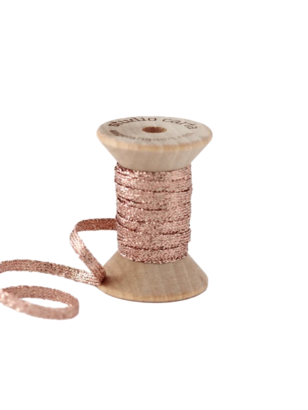 Studio Carta Metallic Braided Ribbon in Rose Gold wrapped around a wooden spool with ribbon unfurled | Twentyseven Toronto
