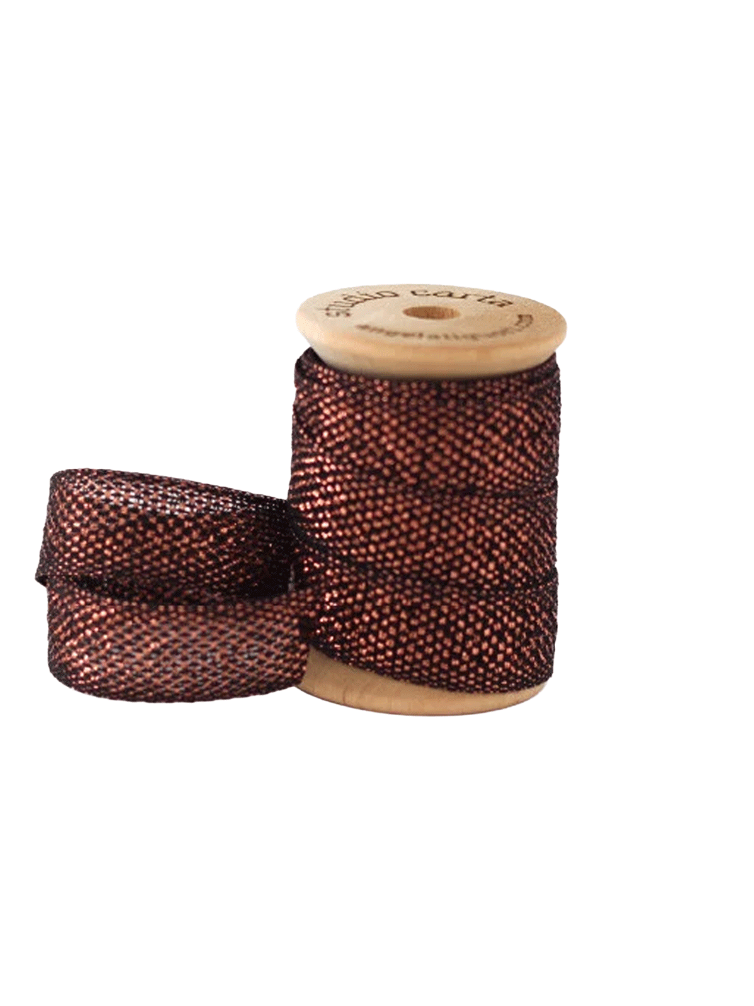 Studio Carta Metallic Loose Weave Ribbon in Black/Copper wrapped around a wooden spool with ribbon unfurled | Twentyseven Toronto