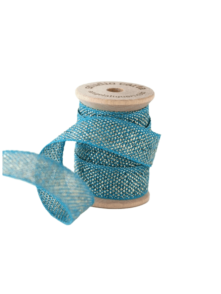 Studio Carta Metallic Loose Weave Ribbon in Peacock/Gold wrapped around a wooden spool with ribbon unfurled | Twentyseven Toronto