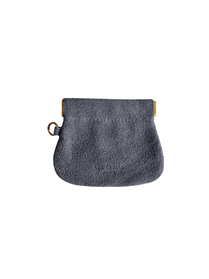 Light purple suede coin pouch in 'Periwinkle' with gold holder on a transparent background | Twentyseven Toronto