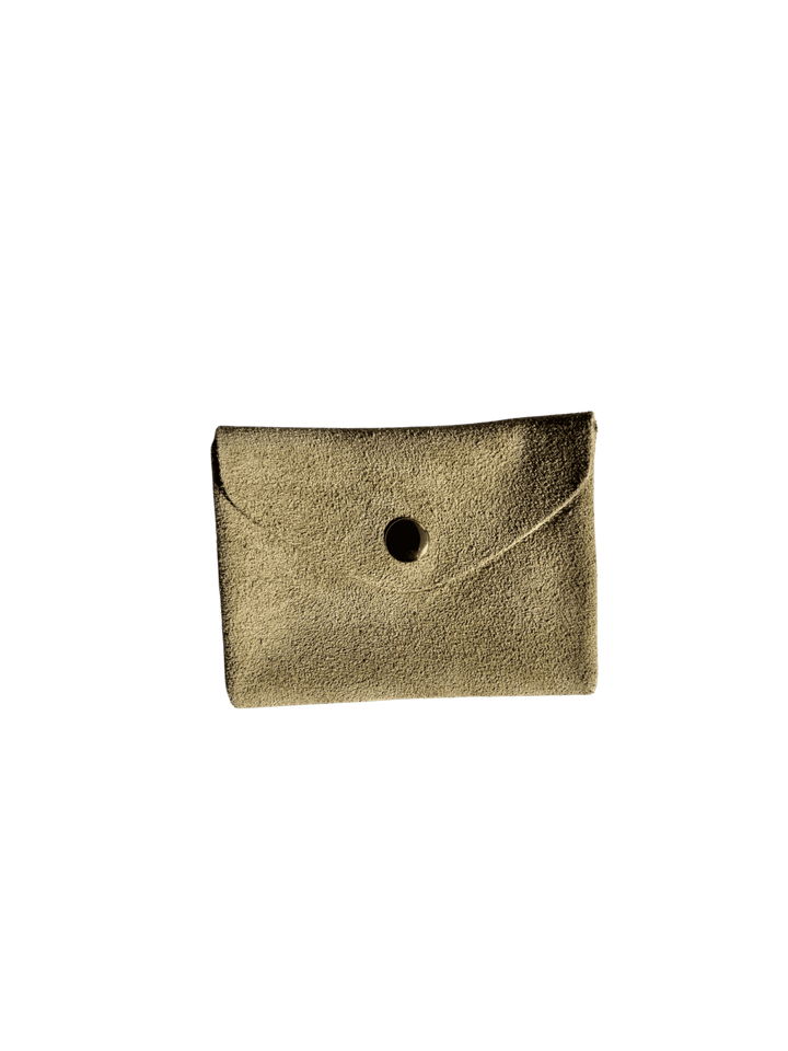 Beige suede coin purse in 'Cream' with a gold button on a transparent background | Twentyseven Toronto