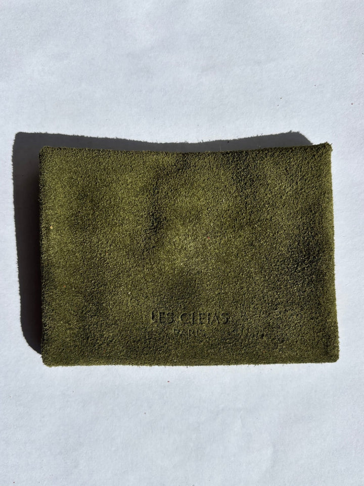 Deep green textured suede coin purse in 'Forest Green' with branding 'Les Cleias Paris', back view | Twentyseven Toronto