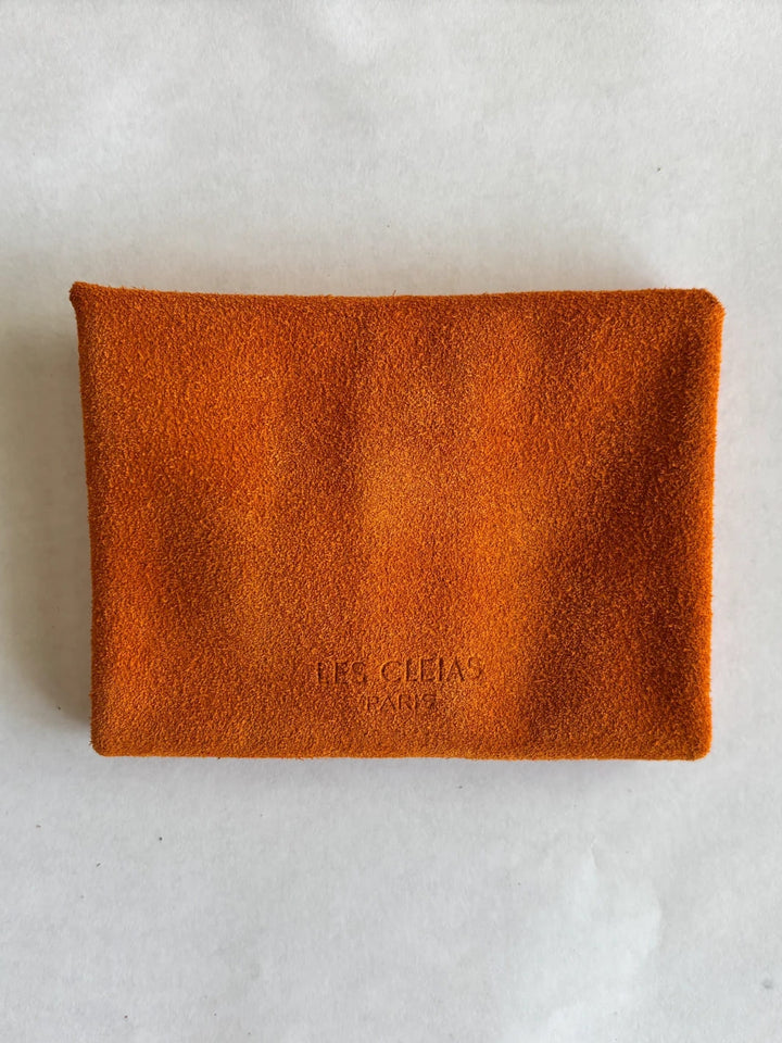 Orange suede coin purse with branding 'Les Cleias Paris', back view | Twentyseven Toronto