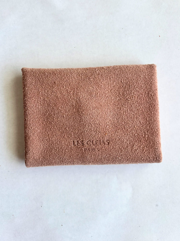 Light pink suede coin purse in 'Rose' with branding 'Les Cleias Paris', back view | Twentyseven Toronto