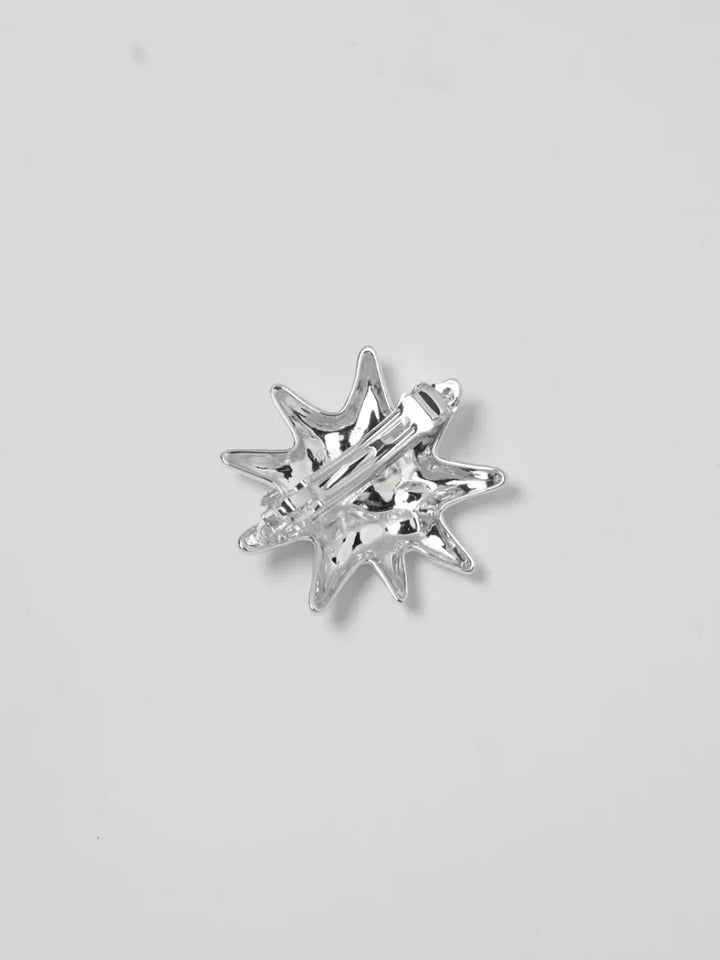 The reverse side of the Sun Barrette in Silver from Wolf Circus, highlighting its secure alligator clip mechanism against a white background | Twentyseven Toronto