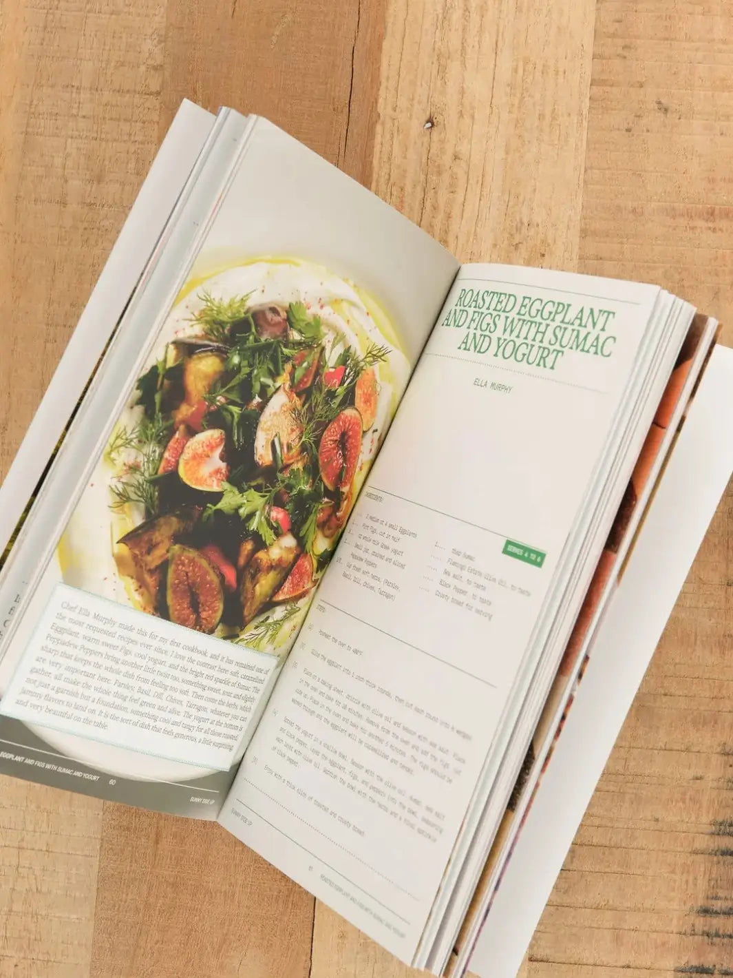 Open page of the Flamingo Estate Sunny Side Up Recipe Book displaying a recipe for roasted eggplant and figs with sumac and yogurt alongside a full-page dish photo | Twentyseven