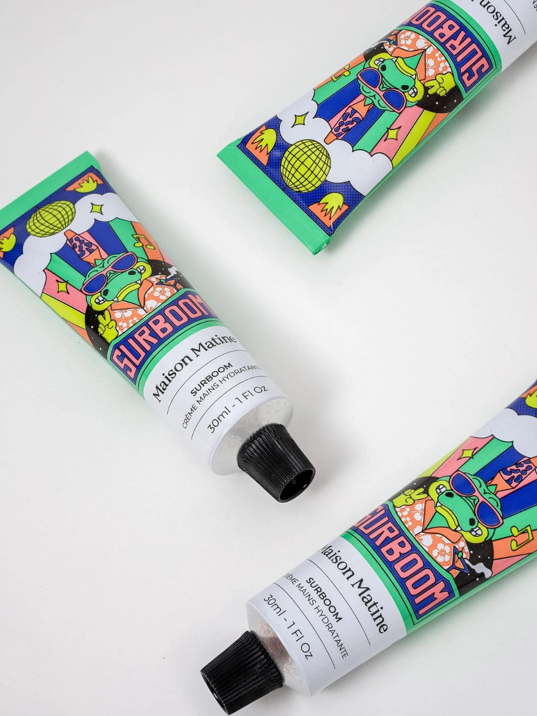 Maison Matine Surboom Hand Cream | Twentyseven Toronto | Three colourful tubes of Maison Matinee Surboom Hand Cream on a white background