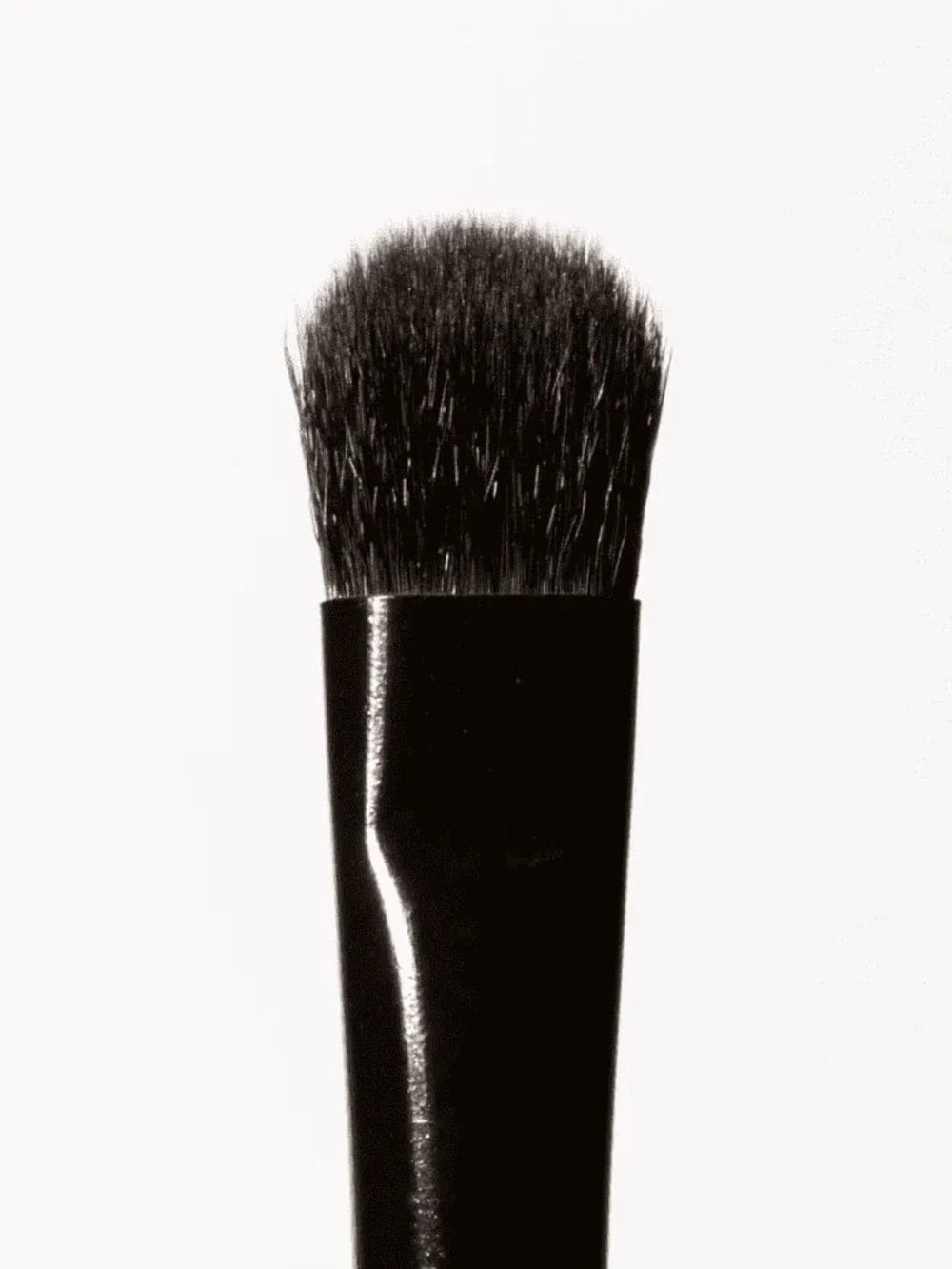 Black 19/99 Beauty Tapered Multi Makeup Brush close up shot on bristles on a white background | Twentyseven Toronto