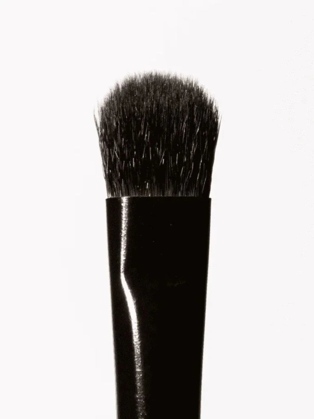 Black 19/99 Beauty Tapered Multi Makeup Brush close up shot on bristles on a white background | Twentyseven Toronto