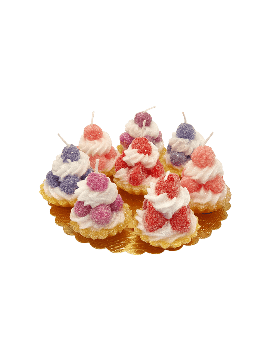 Decorative tarts with colourful fruit shaped candles from Cereria Introna on a transparent background | Twentyseven Toronto