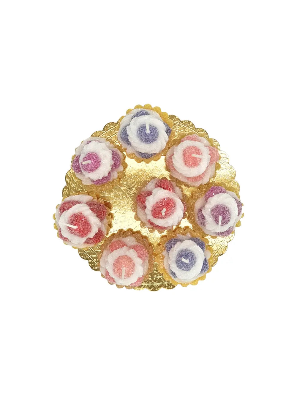 Decorative tarts with colourful fruit shaped candles from Cereria Introna on a white background | Twentyseven Toronto