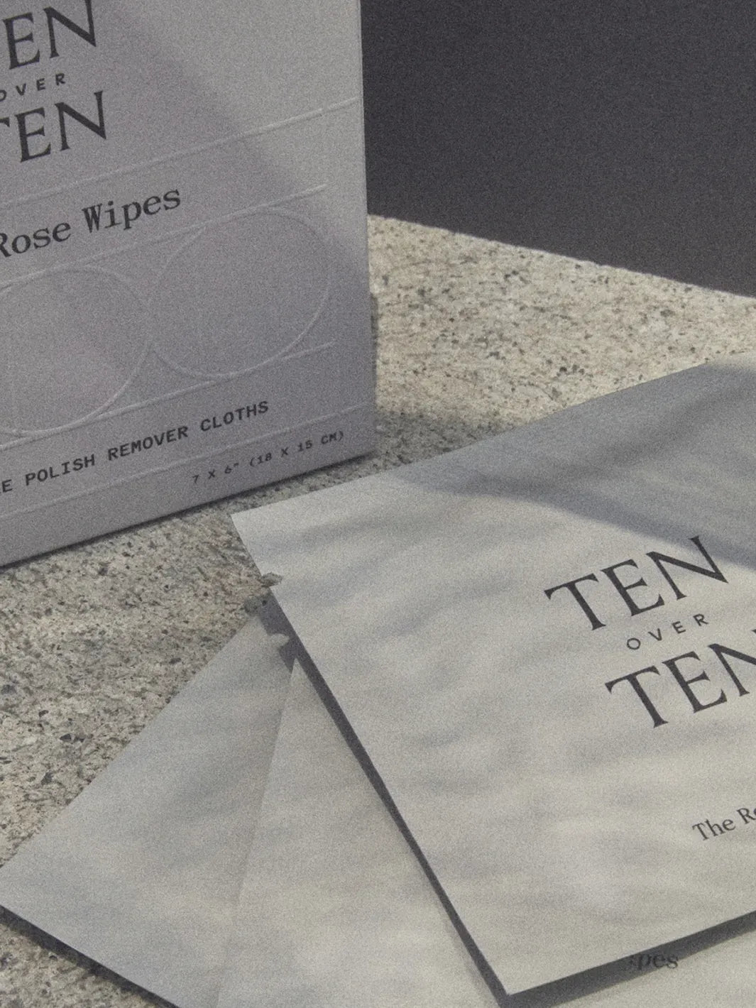 TENOVERTEN The Rose Wipes individually wrapped nail polish remover cloths displayed beside the packaging | Twentyseven Toronto