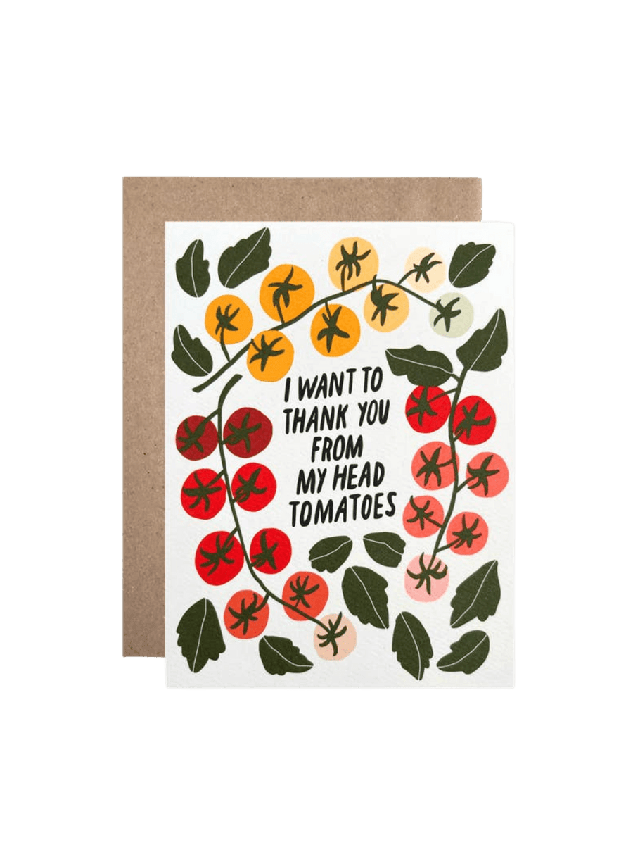 The Hartland Cards Thank You To-ma-toes Card features vines of colorful red, orange, and yellow cherry tomatoes framing the handwritten text "I WANT TO THANK YOU FROM MY HEAD TOMATOES" in bold black lettering, paired with a brown kraft envelope | Twentyseven