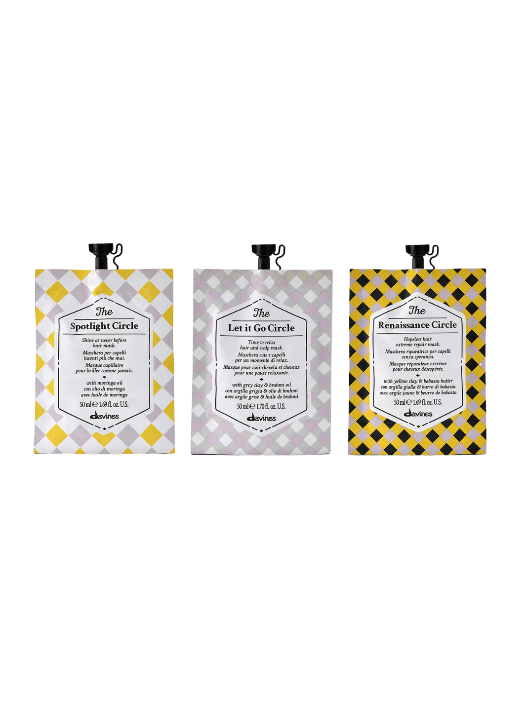 Three Davines Circle Chronicle hair masks, featuring The Spotlight Circle Mask (50ml), The Let It Go Circle Mask (50ml) and The Renaissance Circle Mask (50ml) on a transparent background | Twentyseven Toronto