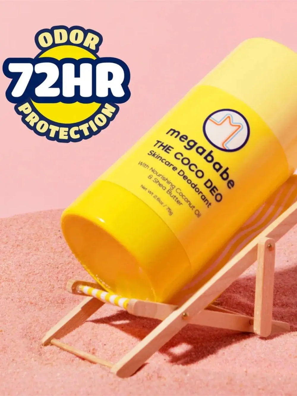 A vibrant yellow deodorant stick rests on a miniature wooden beach chair on pink sand, highlighting the long-lasting freshness of the Megababe The Coco Deo | Twentyseven Toronto