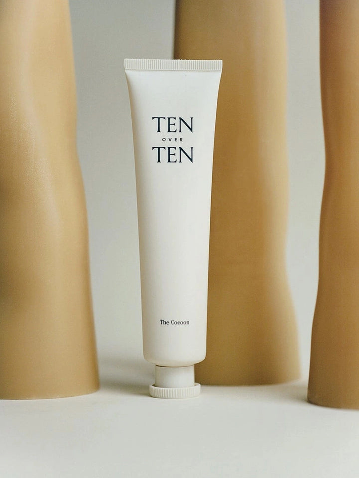 TENOVERTEN The Cocoon Hand + Foot Cream tube displayed against a warm neutral backdrop | Twentyseven Toronto