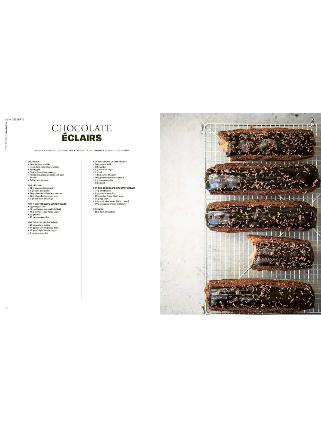 Five long chocolate éclairs with a glossy dark chocolate glaze and cocoa nib sprinkles, resting on a wire cooling rack from The French Bastards cookbook | Twentyseven Toronto