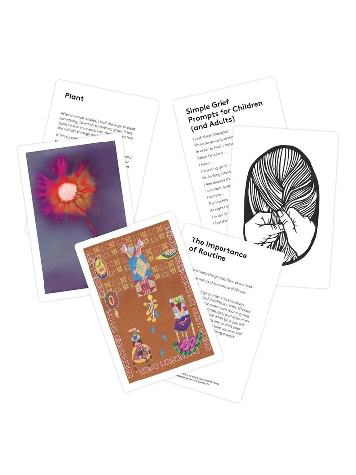 A scattered arrangement displays multiple colorful text and illustrated prompt cards from The Grief Deck by Adriene Jenik against a clean white background | Twentyseven Toronto