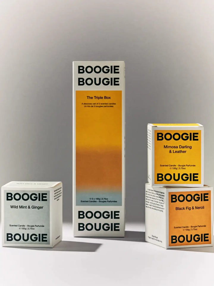 Three Boogie Bougie boxes, 'The Triple Box While Summer Shifts' candle gift set on a gray background | Twentyseven Toronto